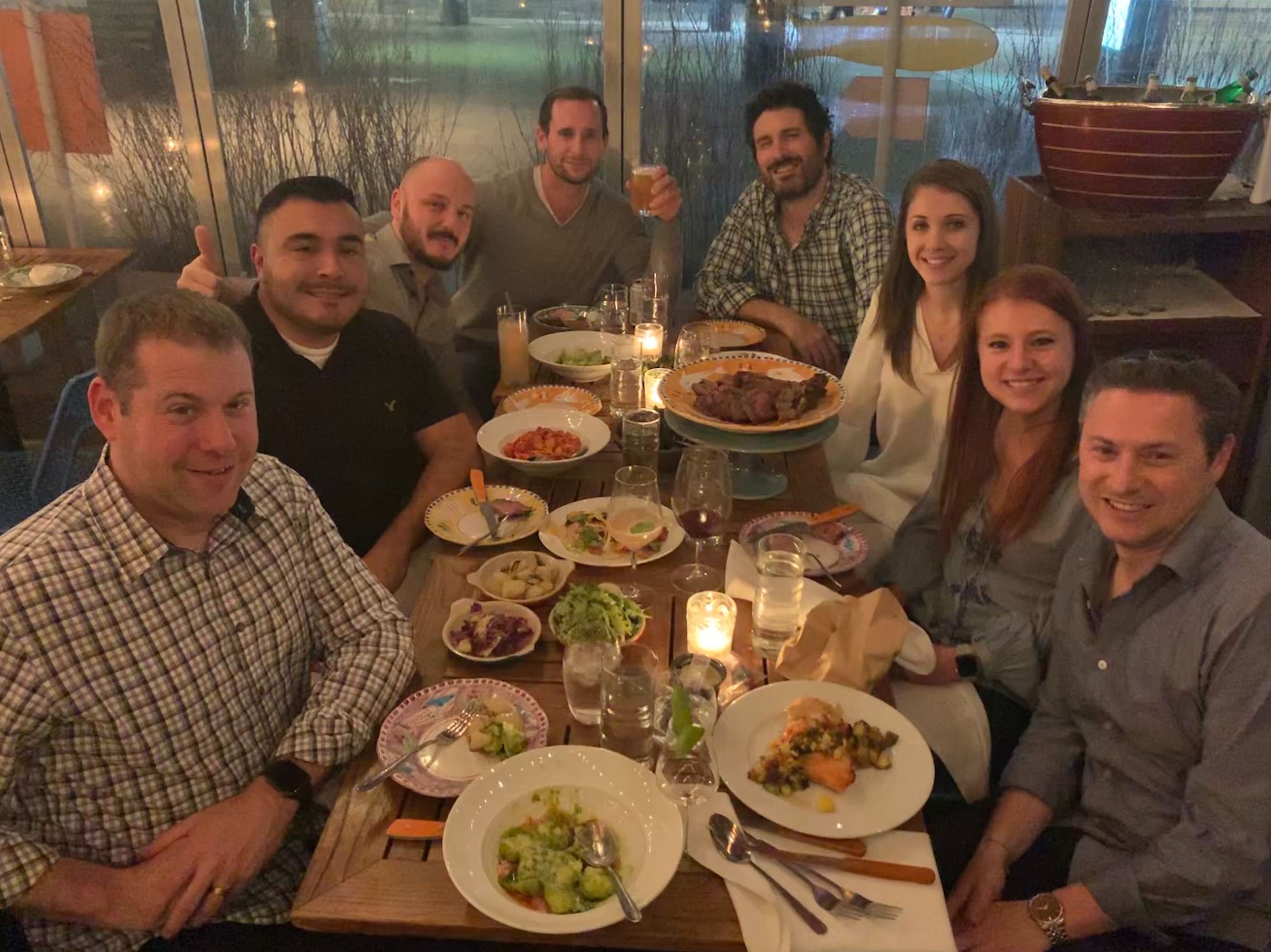 Colleagues dining around in New York.