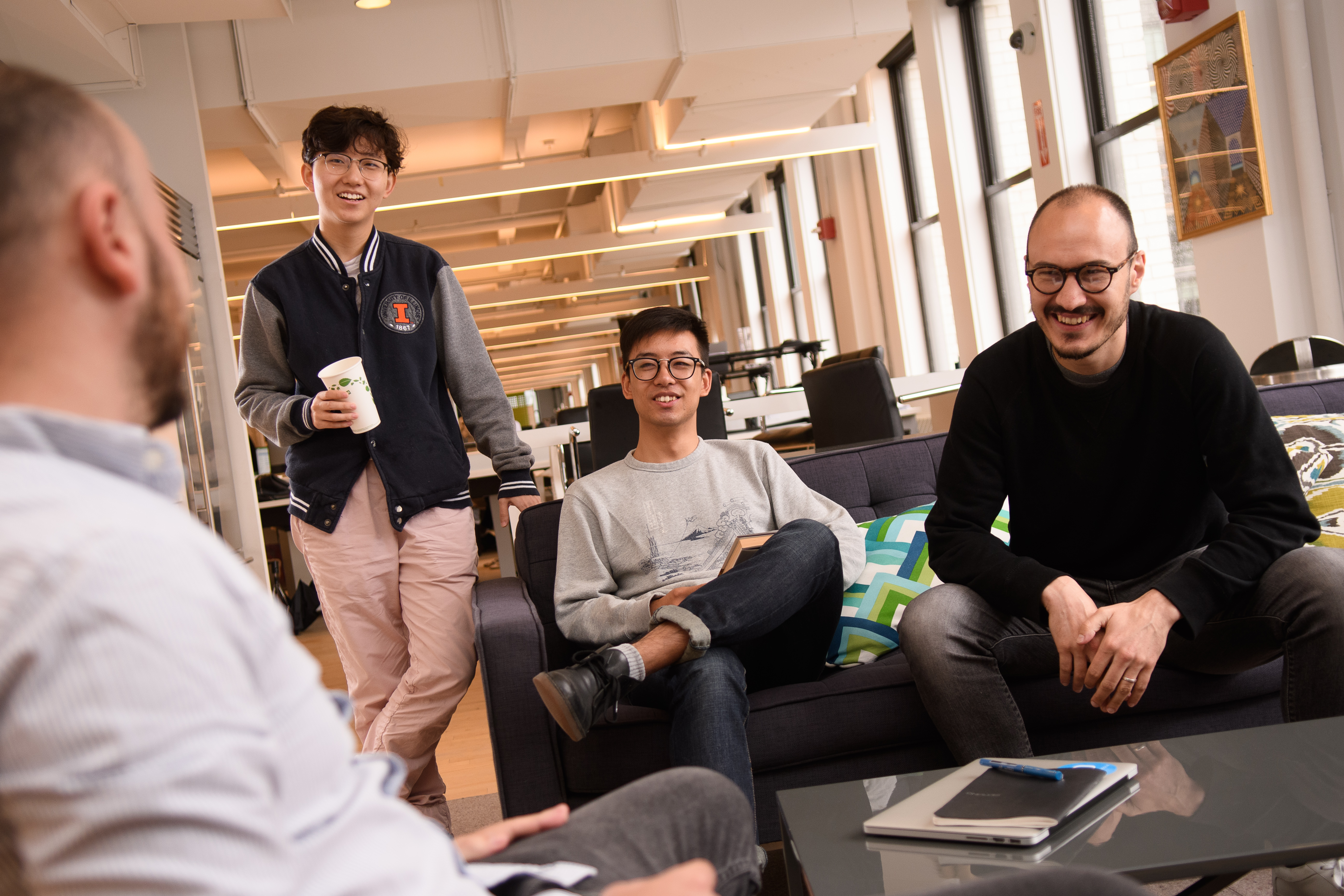 Group of colleagues on data science team having a meeting.