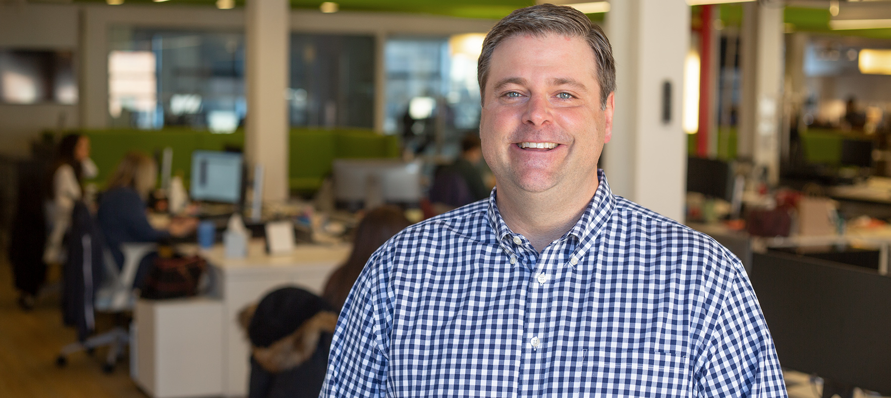 Shaun Farrar, Senior Director of Global Media at Monster in the office